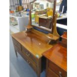 An Edwardian inlaid mahogany dressing table with two short and one long drawer, 58" x 42" x 19"