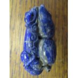 A modern Chinese carved lapis lazuli ornament