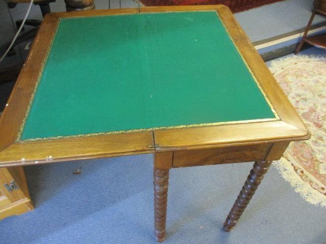 A 19th century walnut card table with a rotating, fold over top on bobbin turned legs - Image 2 of 2