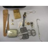 A mixed lot of white metal French buckles, opera glasses, a silver napkin ring, cufflinks and