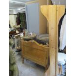 An early 20th century pine single bedstead