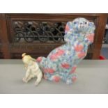 A mixed lot to include a ceramic multi coloured dog and baby
