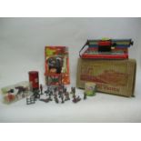 A mixed lot of vintage toys to include lead toy figures, Flintstone figures, a Post Office moneybox,