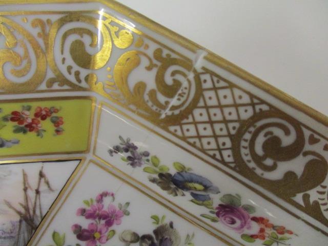 A pair of 19th century KPM octagonal dishes, decorated with panels of harbour scenes and flowers - Image 3 of 11