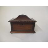 A 19th century boxwood and ebony inlaid rosewood and oak tea caddy, with a hinged pagoda lid,