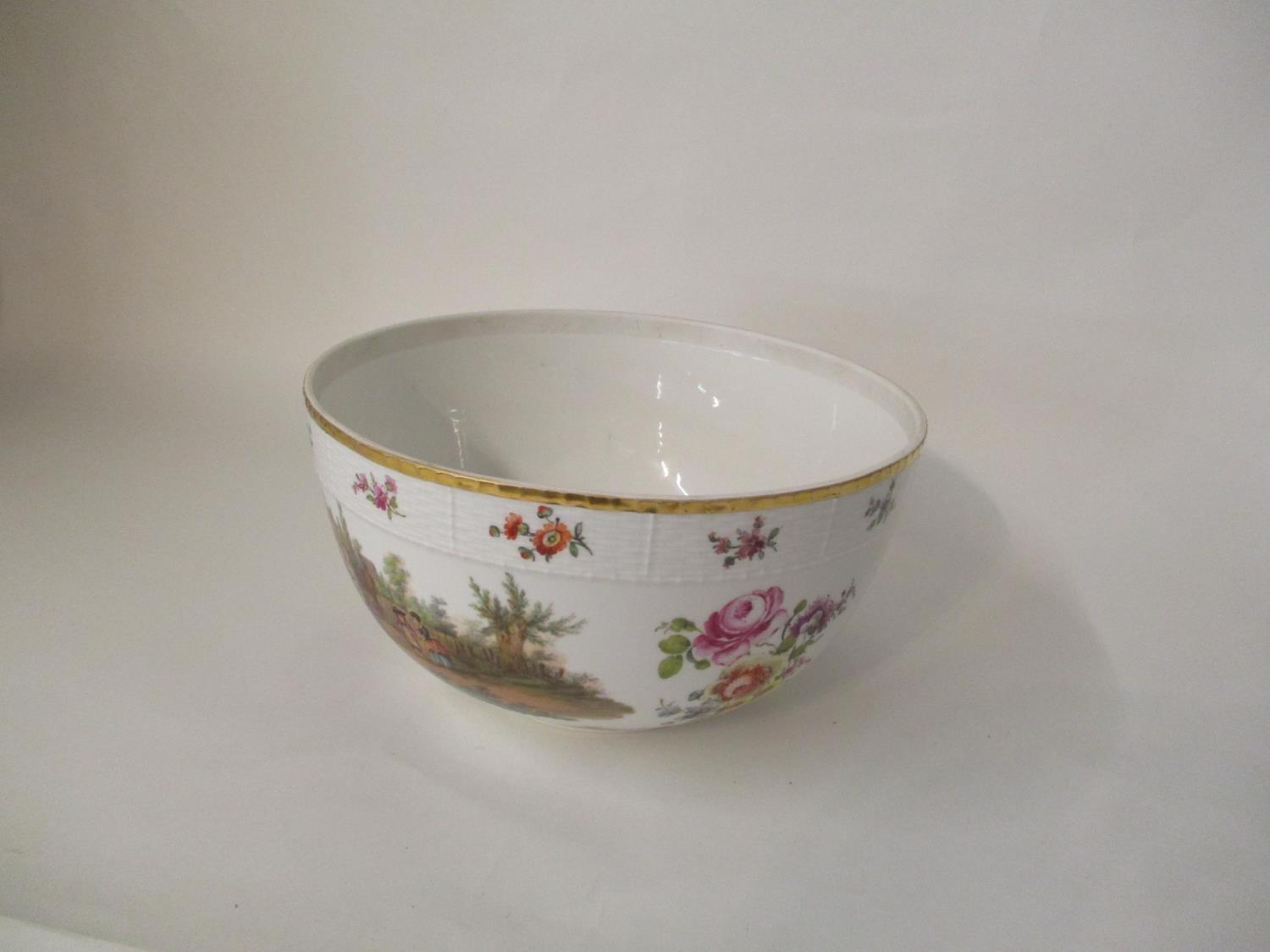 A late 19th century KPM porcelain bowl decorated with a group of men around a table in a garden - Image 2 of 4