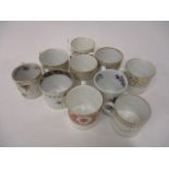 Ten late 18th and 19th century Worcester, Derby and other coffee cans decorated with enamels and
