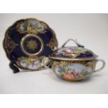 A 19th century Meissen cup, cover and saucer with twig handles, decorated with panels of couples
