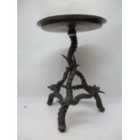 A late 19th century horn pedestal table with a brass top, on seven jointed small antelope horns 19