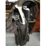 A Cobra Gravity Pack set of Ladies golf clubs in a golf bag (putter missing)