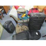 A mixed lot of sports bags and travelling bags to include two Samsonite travelling cases, a golf