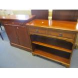 A reproduction mahogany, two door cabinet, together with a yew wood small bookcase with two drawers