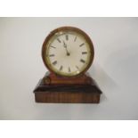 A late 19th century French mantel clock, the movement with a painted dial and Roman numerals, the