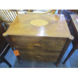 An early 19th century mahogany converted commode having string inlay and fluted columns