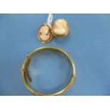 Two 9ct gold cameo brooches, together with a rolled gold bangle