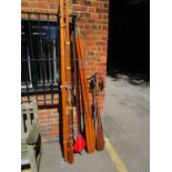 A pair of 1960s wooden dingy oars, a Collar mast, boom and lugg and two other wooden paddles,