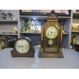 A 1930's oak cased mantle clock and a late 19th century stained pine case mantle clock