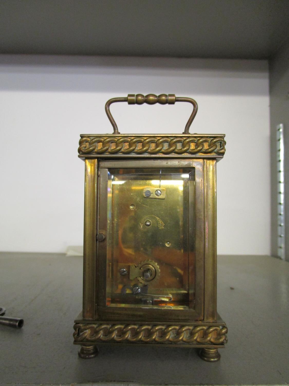 A French brass cased five window carriage clock, with key - Image 3 of 3