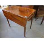 An early 19th century mahogany Pembroke table, 28" x 30" x 18" un extended and 28" x 30" x 38"