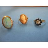 Three 9ct gold dress rings to include a sapphire ring, a cameo ring and an onyx ring