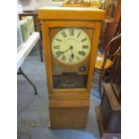 An early 20th century oak cased National Time Recorder clocking in clock A/F