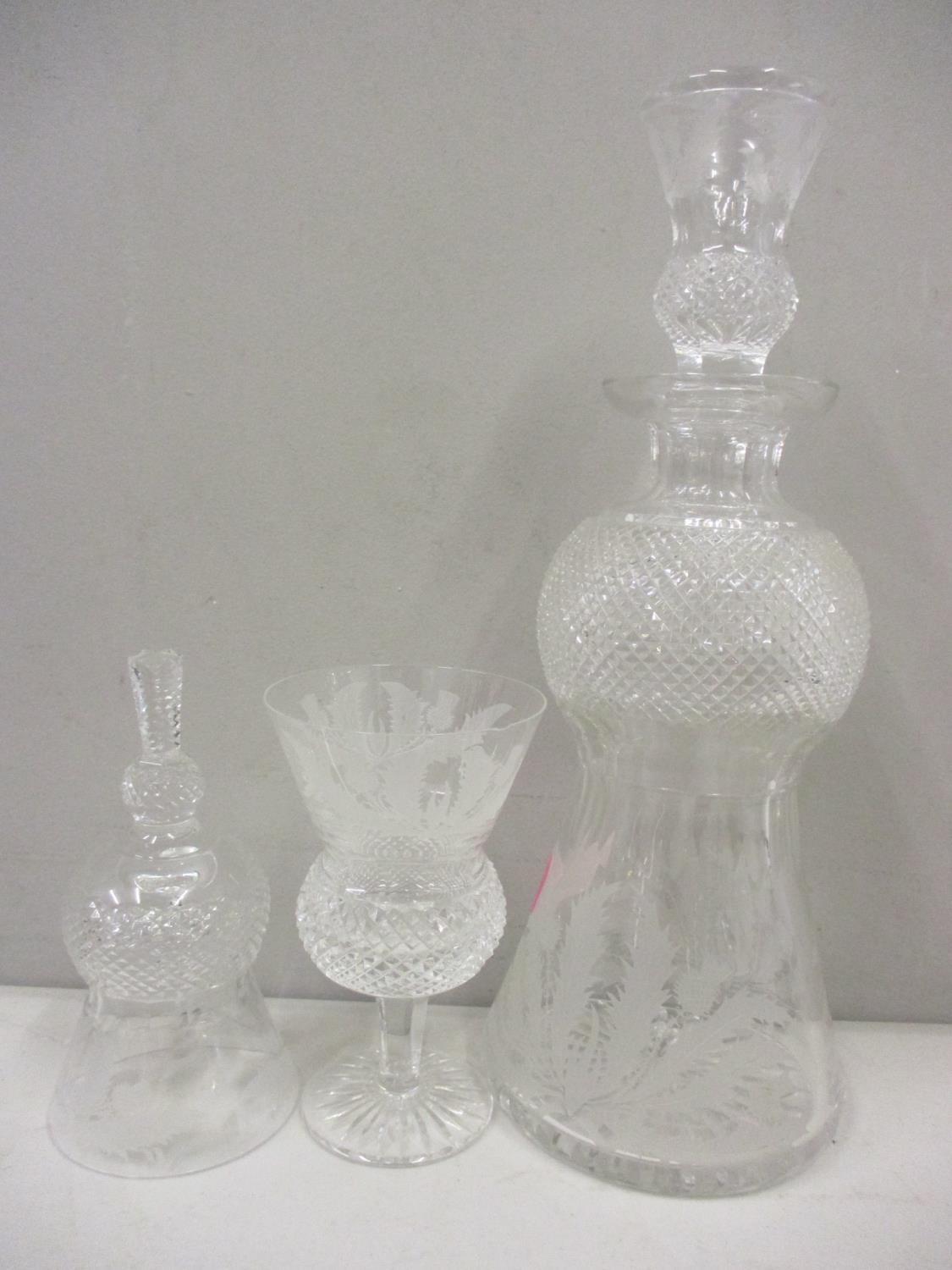 Three pieces of Edinburgh Thistle pattern glassware to include a decanter