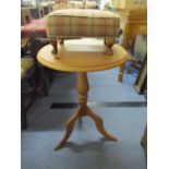 A reproduction circular occasional table, together with a small footstool