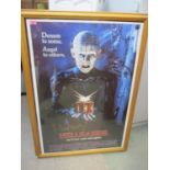 A Hellraiser poster signed by Doug Bradley, framed