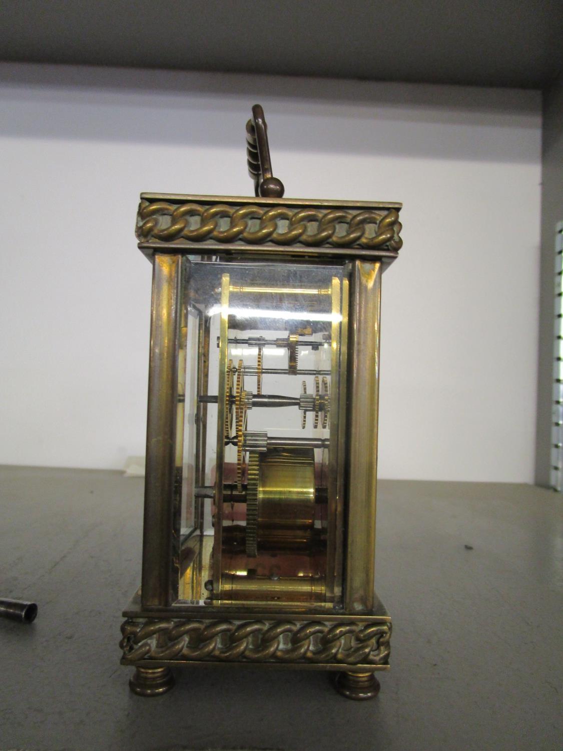 A French brass cased five window carriage clock, with key - Image 2 of 3