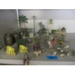 A collection of lead landscape items, farm animals and equipment