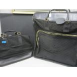 A late 20th century black canvas weekend bag, together with a matching suit carrier