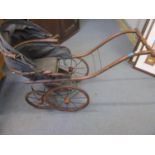 A reproduction Victorian style dolls pram