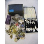 A mixed lot to include costume jewellery, a cased set of spoons and a silver topped jar