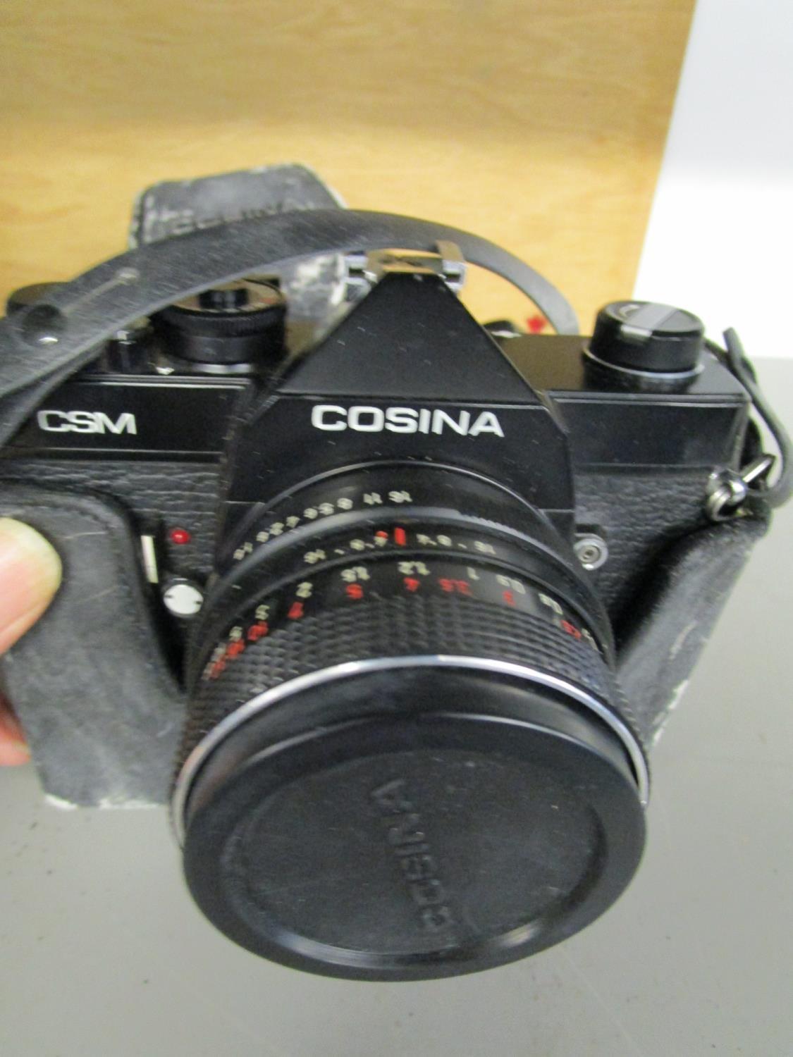 A Cosina CSM camera in a leather case