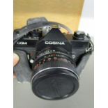 A Cosina CSM camera in a leather case