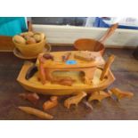 A selection of wooden treen to include a Noah's Ark with animals, a Shakers American Piggin, a tazza