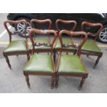 A set of six William IV rosewood dining chairs, standing on fluted legs