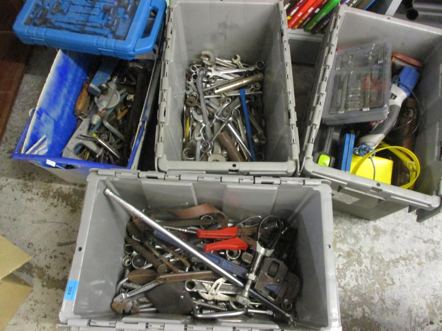 A selection of tools to include spanners, drills and other items