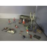 A quantity of vintage lead soldiers, model railway accessories and a Hornby North Eastern open wagon