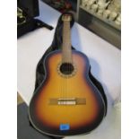 A Valencia Spanish acoustic guitar in a slip case