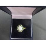 An 18ct gold, diamond, emerald and opal ring, 4.25g