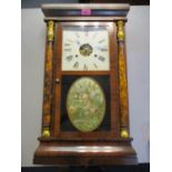 A late 19th century/early 20th century Seth Thomas rosewood 8 day wall clock, 25"h x 15"w