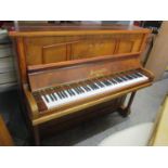 A Normelle, London walnut cased upright piano, 49" h x 58 1/2" w