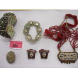 Indian silver coloured and gilt jewellery to include a necklace, two bracelets, a brooch and a