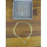 A gold bachelor link bracelet stamped 375, 2.75g, a 9ct gold pendant on a fine chain and a pair of