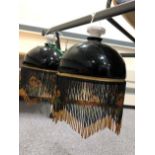 A pair of Art Deco beadwork ceiling light shades with modern fittings.