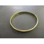 An 18ct gold bangle 29.15g