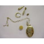 A 9ct gold locket on a chain and various earrings and stud marked 22ct