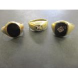 Three gold signet rings, one stamped 10-14k, one 9ct and another stamped 9, 15.95g