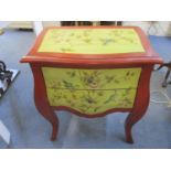 A painted serpentine fronted chest of two drawers